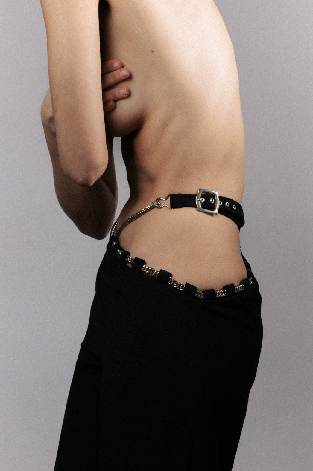 In House Blend Paris-made black trouser with silver chain detail, sustainable luxury women’s fashion.